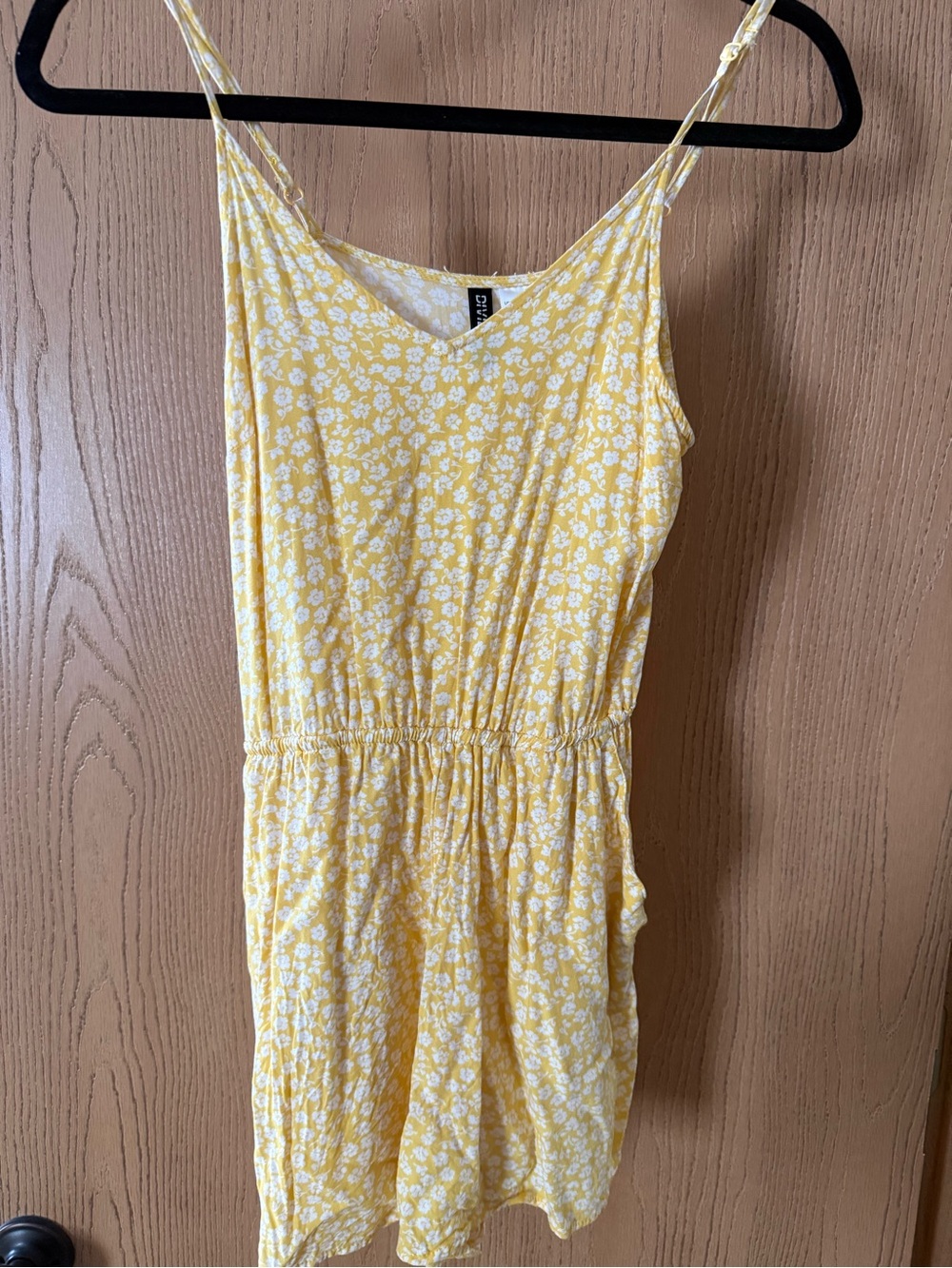 Yellow Mini Floral Romper With Adjustable Straps and Pockets